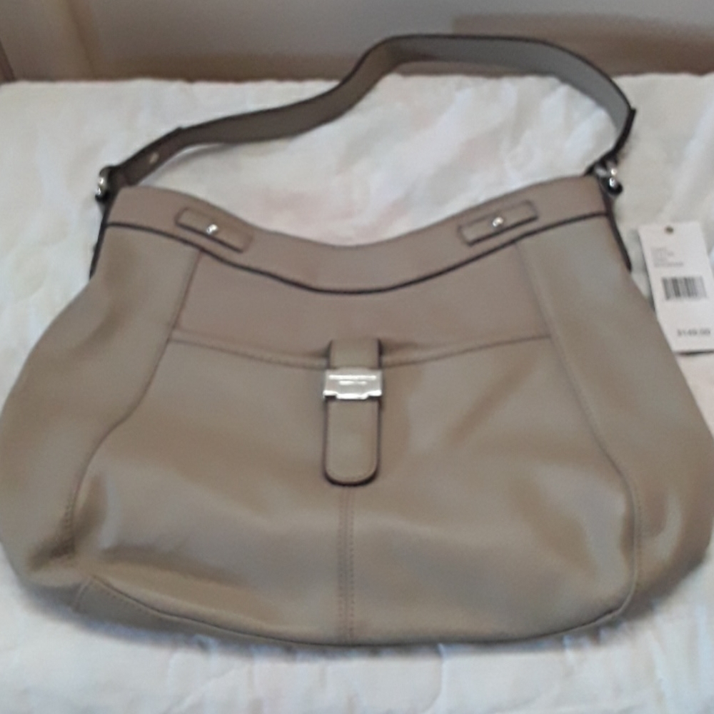 Tignanello shoulder purse with pockets on outside